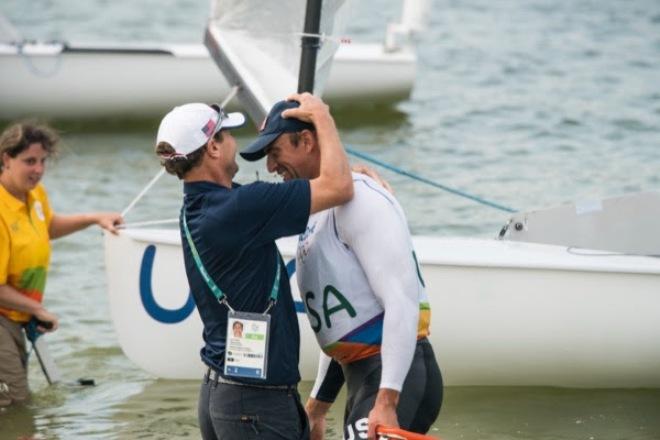 Team Leader Josh Adams on the beach with Caleb Paine after the San Diego native secured Bronze in the Finn at rio 2016 © Amory Ross / US Sailing Team
